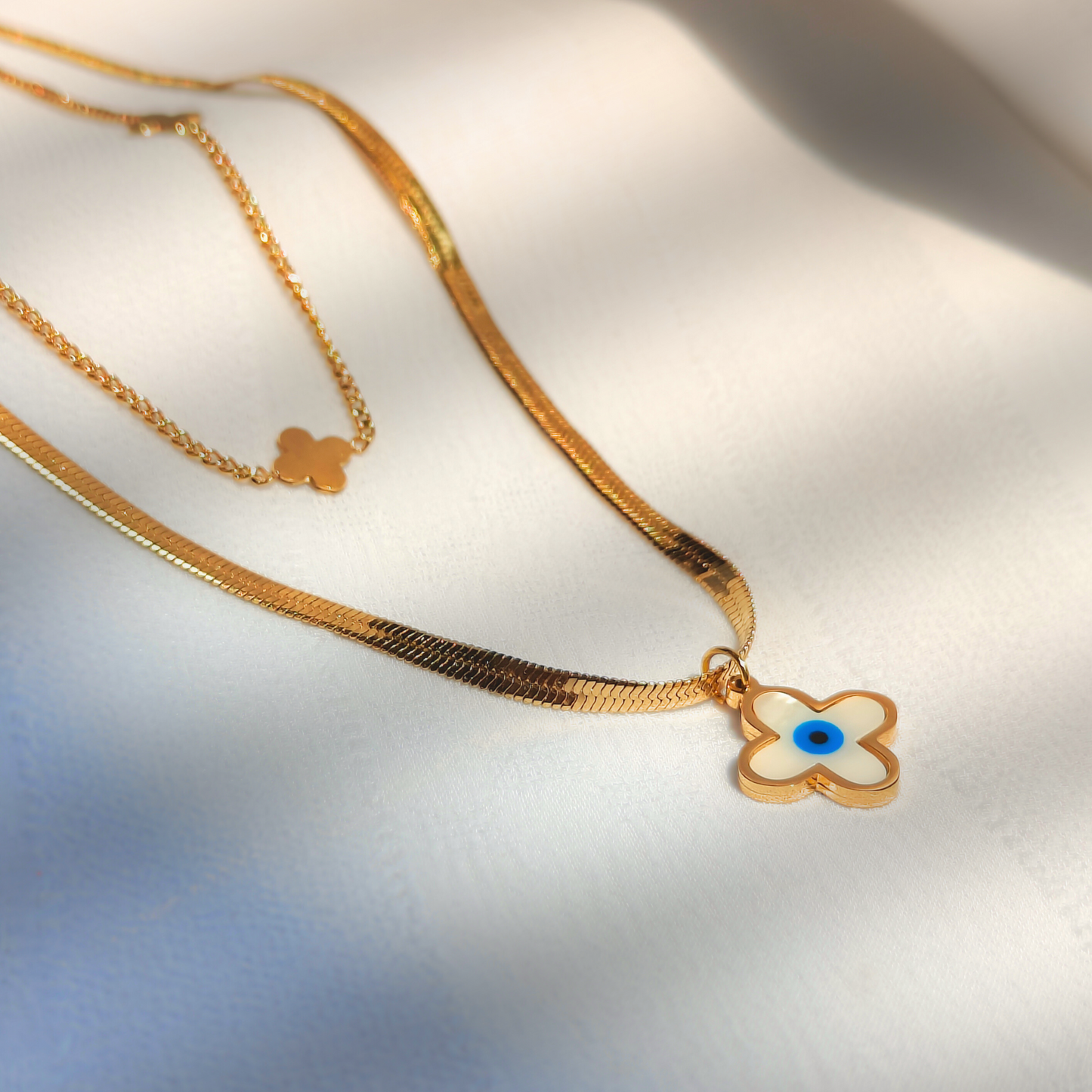 Divine Duo Anti-tarnish Pendant in natural light with shadows falling on it