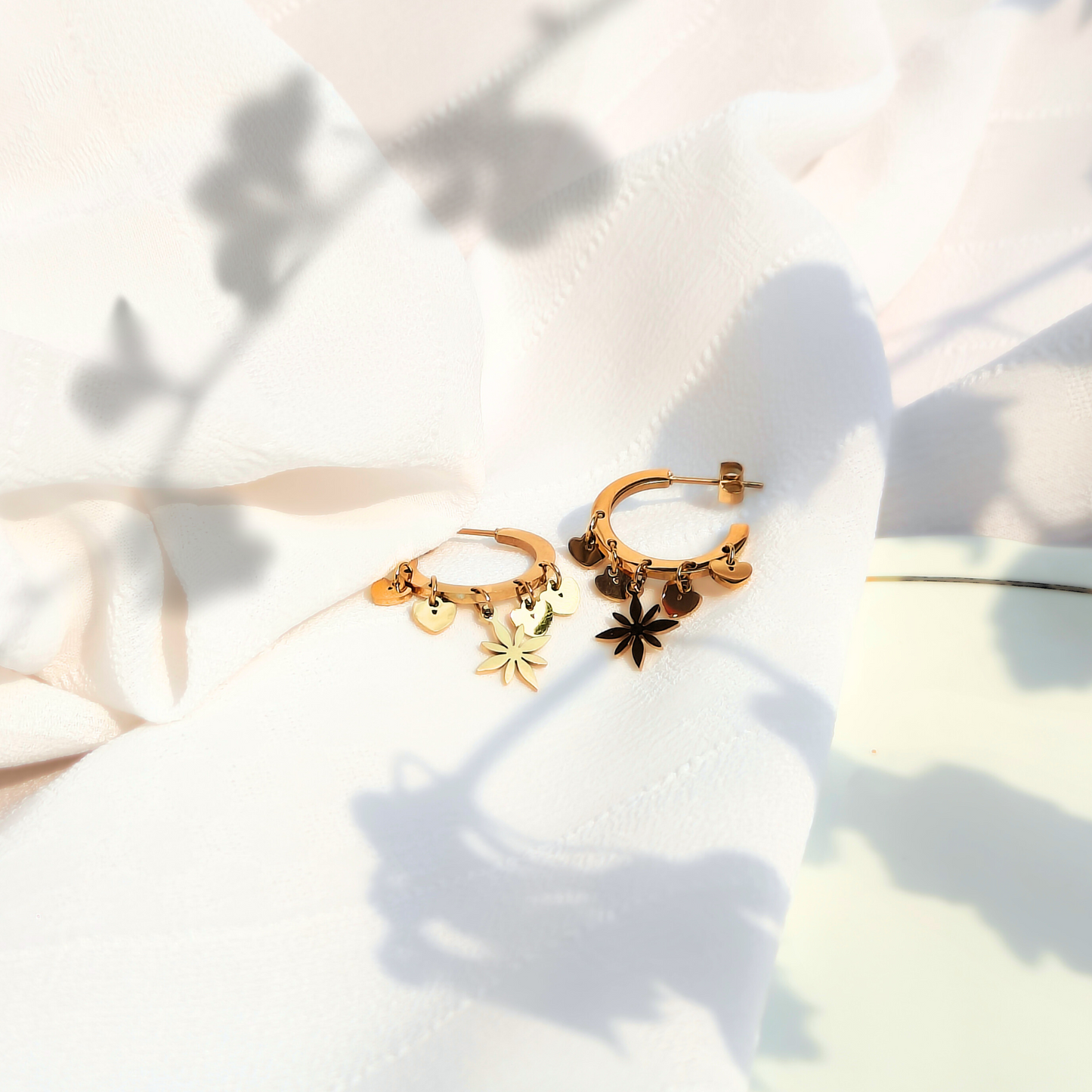 Celestial Heart Anti-tarnish Earrings in natural light with shadows falling on it